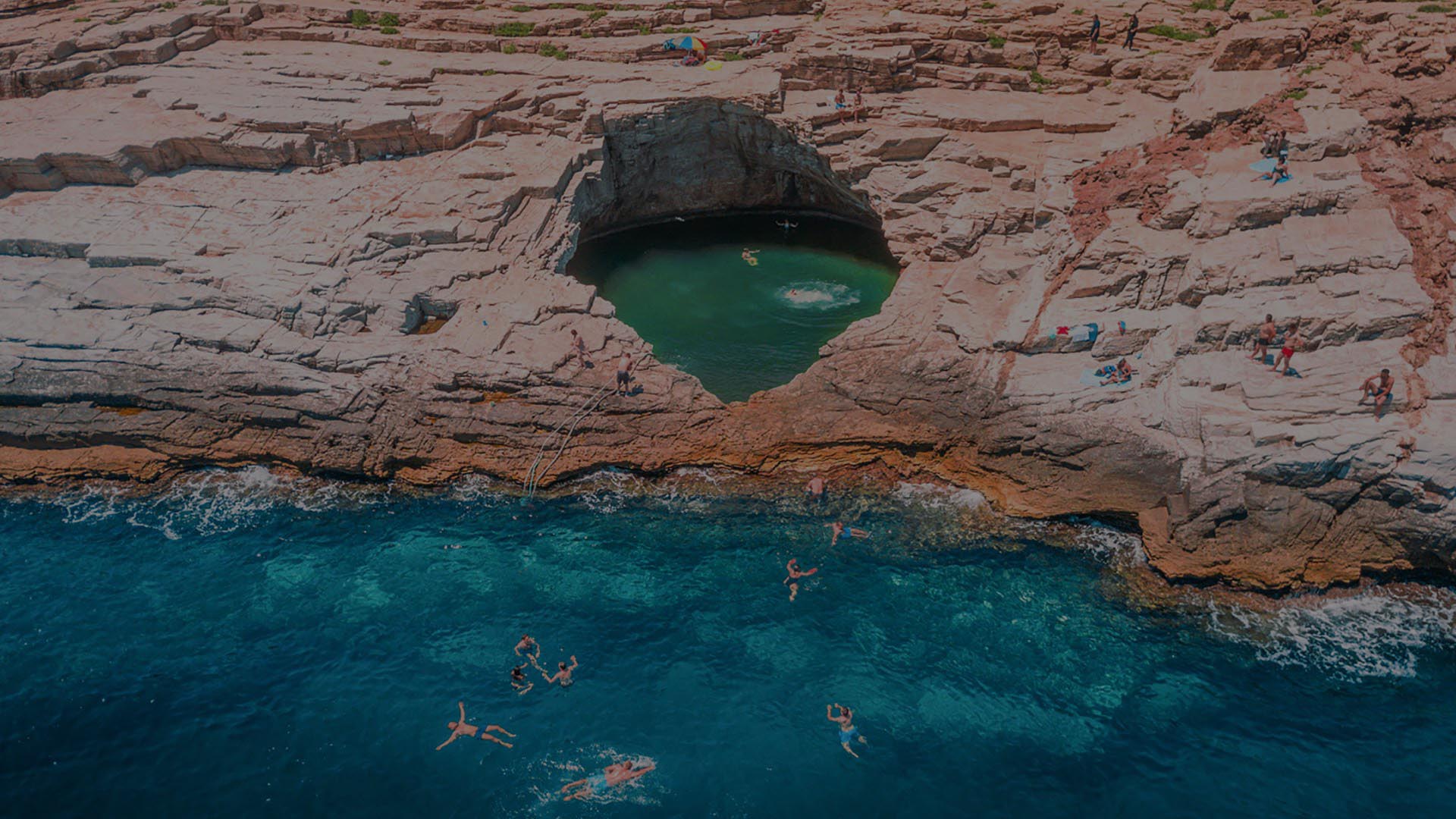 4 giola laggon the natural pool carved into the rock by the sea in thassos edit 1 1